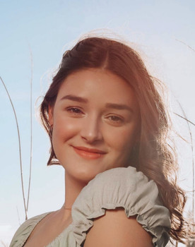 Ava Nobert as The Shadow