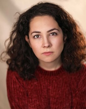 Gunce Ates as Villager Mary (uncredited)