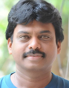 A. Karunakaran as cameo appearance