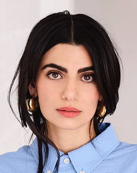 Claudia Doumit as Zoey