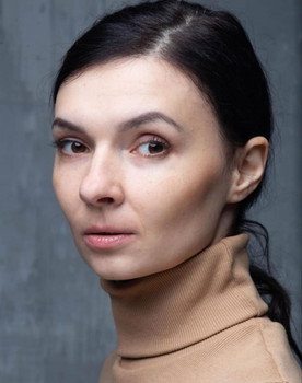 Tetiana Sydorchuk as Maria's mother