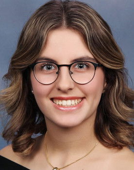 Kamly Shaheen as Newscaster