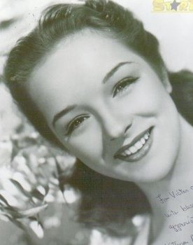 Kathryn Adams as Gloria Mitchell