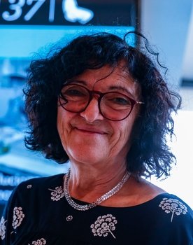 Adriana Lestido as Adriana Lestido