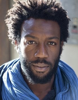 Jean-Christophe Folly as ER Doctor