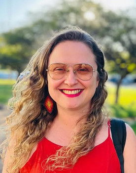 Fran Rebelatto as Interviewer (herself)