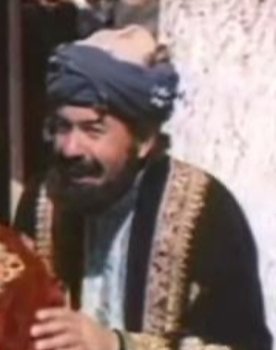 Khatam Nurov as Merchant
