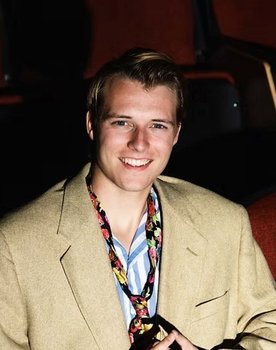 Connor Klebs as The Figure of Light