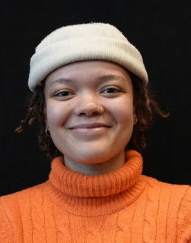 Sophia Holt as The Vendor