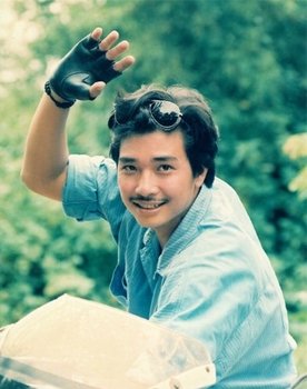 Lê Tuấn Anh as Handcuffed Man