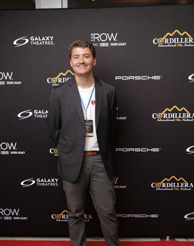 Noah Carnes as The Voice