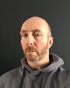 Tom Dunne as Stryker