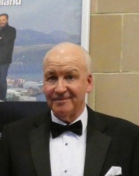 Joe Scott as Malcom Lyons