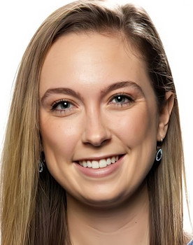 Madison Forsey as Self - News Anchor (archive footage)