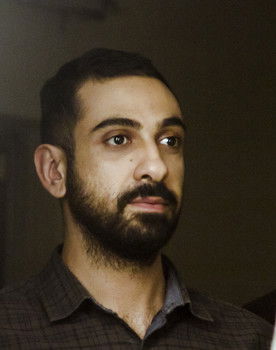 Pouyan Fereidooni as 