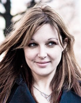 Adriana Maggs as Woman