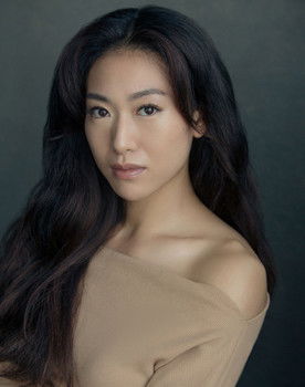 Quanna Luo Masterson as The Fascinator