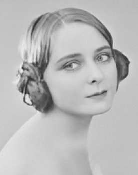 Nellie Savage as Madame Mystera