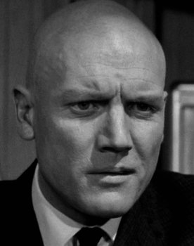 John Hollis as Moriarty's Gunman