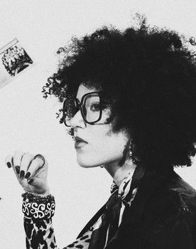 Chanel Elisha Holness as Extra 5