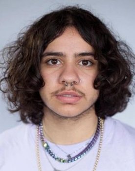 Felix Mufti as Roman