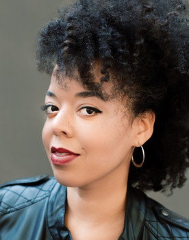 Christina Childress as Justine's Hostess