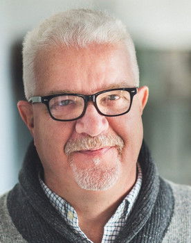 John Ralston as Technician / Villager