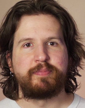 John Wolfe as Rude Business Man