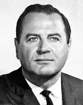 Brad Dexter as Wallace Slocum