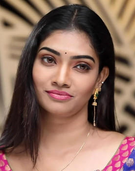 Krithika as Varsha (Nandini's cousin, Antagonist)