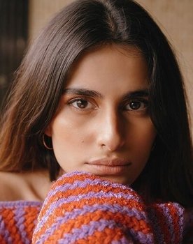 Aisha Ahmed as Esha