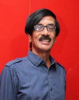 Manobala as Ganesh's father