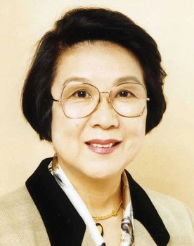 Junko Midori as Miss Theobald (Voice)