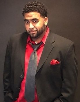 Jason Thibodeaux as Reggie