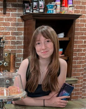 Alecks Connaughton as Herself, Girl