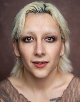 Mason Alexander Park as Carrie