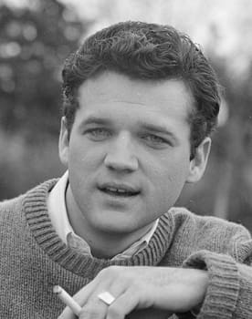 Jack Nance as Burton