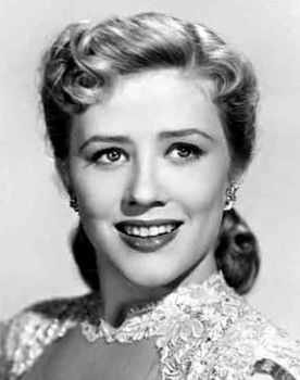 Joyce Holden as 'Tiny' Ford - Photographer