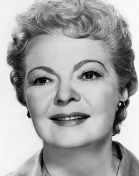 Margalo Gillmore as Cora Caighn