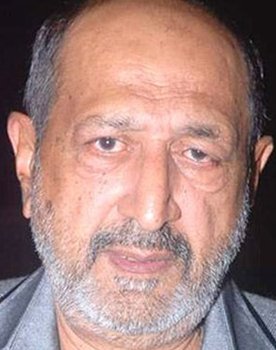 Tinnu Anand as Mr. Bedi
