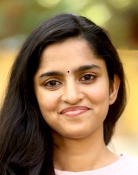 Divya Sripada as Devi