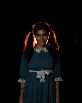 Hlnd Ibrahim as Emilya Grady