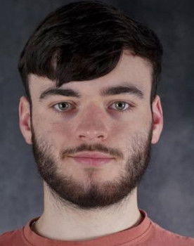 Adam O'Brien as Robber 1