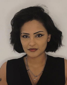 Zelda Khan Black as Bank Employee