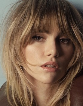 Suki Waterhouse as Iris Evans