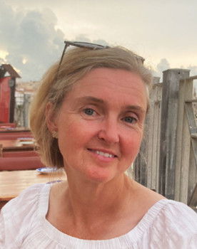 Amy West as The Inspector