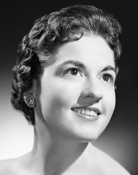 Suzanne Langlois as Housekeeper (uncredited)