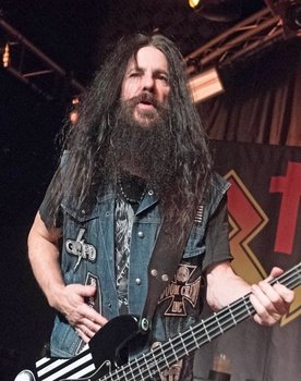 John DeServio as Bass