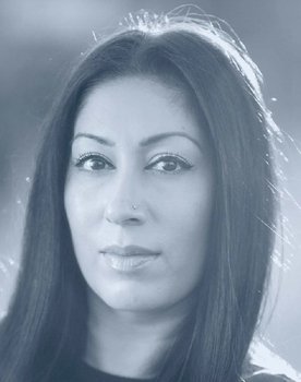 Sofia Abbasi as 1980's Local Resident