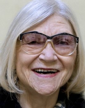 Nora Brockstedt as Syngende dame